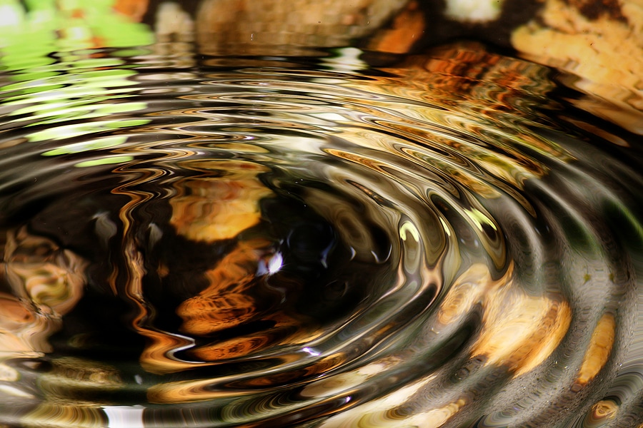 Gentle ripples spreading across water