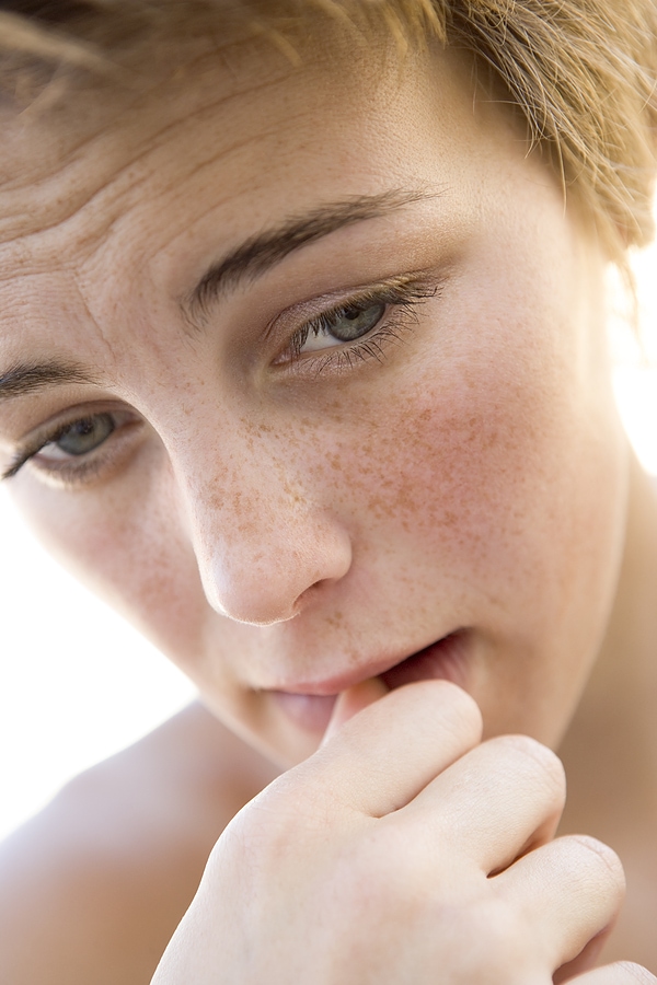 A woman feeling worried
